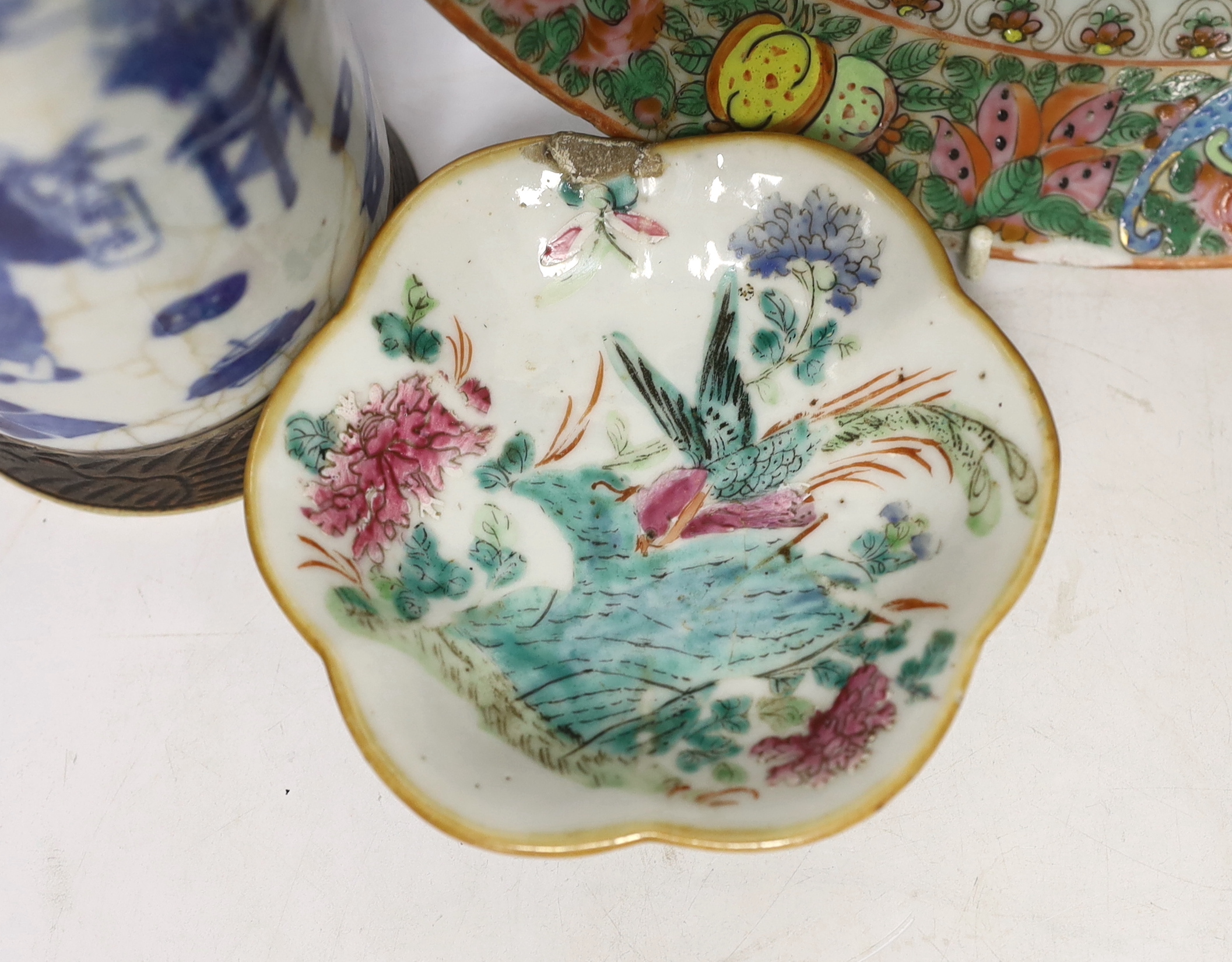 Five Chinese porcelain items including a blue and white crackle glaze cylindrical vase and a celadon glaze tea bowl and stand, largest 29cm in diameter